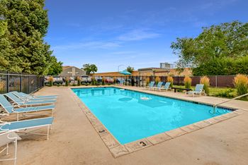 Swimming pool with lounge chairs